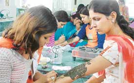 Students participate in different competitions being held during the 47th Panjab University Youth and Heritage Festival at Ramgarhia Girls College in Ludhiana on Monday