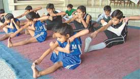 Students in action during the District Yoga Championship held at the Saraswati Modern School, Civil Lines, Ludhiana on Sunday