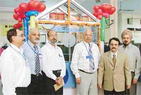 Mr R. Karthikeyan, DGM, SBI, along with the banks officers at the inauguration of the Internet browsing centre at the Civil Lines branch in Ludhiana on Monday