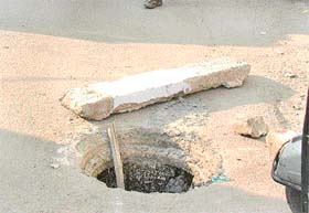 An open manhole in Krishna Nagar, Ghumar Mandi, which has become a threat for residents