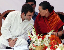 UPA Chairperson Sonia Gandhi has a word with Congress MP Rahul Gandhi at the inauguration of the Rajiv Gandhi Foundation Medical Camp in Jagdishpur (Uttar Pradesh) on Wednesday.