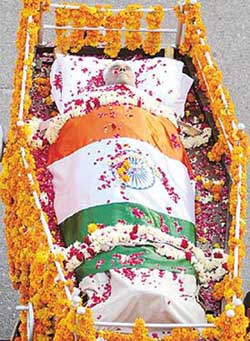 Former President K.R. Narayanan's body being taken for the funeral in New Delhi on Thursday. 