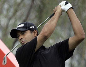 Arjun Atwal tees off on the first day of the Champions Golf Tournament in Shanghai