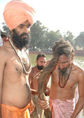 Sadhus take a holy dip at the Kapal Mochan mela in Yamunanagar on Saturday