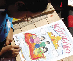 A participant at an on-the-spot painting competition held at the British Council on Sunday