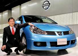 Nissan COO Toshiyuki Shiga presents the new Nissan Wingroad Wagon at an unveiling in Tokyo on Monday