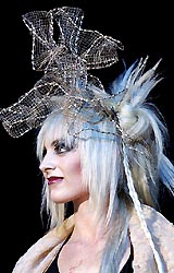 A model presents a creation by hairdresser Geniya Rozen at the Intercharm, 2005, exhibition in Moscow on Sunday