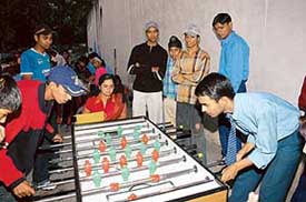 Youngsters at a table soccer meet held at DAV School, Surajpur, on Sunday