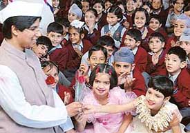 Chacha Nehru is greeted with flowers by students of DAV School, Sector 15, Chandigarh, on Monday