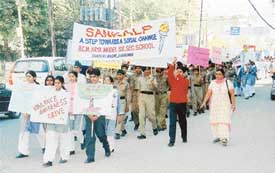 NCC cadets and students belonging to the Sankalp group of BCM School take out a rally against corruption