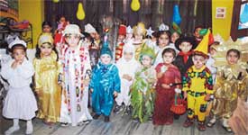 Students of Swiss International School after a fency dress competition organised at the school on Monday