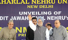 Prime Minister Manmohan Singh, HRD Minister Arjun Singh and JNU Chancellor Karan Singh after unveiling the Nehru statue on the JNU campus in New Delhi on Monday