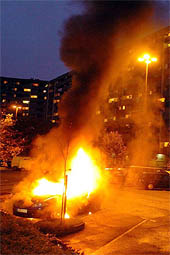 A car burns in the La Reynerie housing project of Toulouse