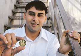 Gurpreet Sandhu with the “rare coin” in Mohali on Tuesday.