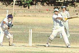 The SD batsman plays a shot during the finals of the Panjab University Inter-College Cricket meet held at PU grounds on Tuesday.
