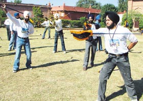 Contestants for the upcoming Mr Singh International Contest practice Gatka
