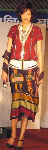 A model showcases a creation of an Assamese designer, based on ethnic theme, at a fashion show organised by the Khadi and Village Industries in Guwahati on Tuesday night.