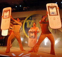 Dance troupe performs at the launch of Motorolas Made-in-India suite at a press conference in New Delhi on Wednesday.