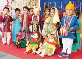 Students of Lovely Lotus played 'Gude Guddi da viah' today as part of Children's Day celebrations
