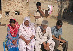Mr Mohammad Sabir Ali (third from left), who has lost his mental balance, along with his wife Asghari Bibi and children at Rohira village in Ludhiana district on Wednesday. 
