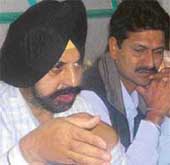 Mr Manjit Singh Sethi, municipal councillor, at a press conference in Mohali on Thursday. Mr Sham Bansal, (right) municipal councillor, is also seen in the picture.