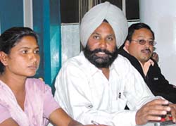 Mr Amarjit Singh Ansal, secretary, state unit of the All-India Trade Union Committee, briefs media persons demanding payment of dues for workers during a press conference in Jalandhar on Thursday. On his right is Ms Devi Kumari, general secretary, Bawa Shoes Workers Union, Goindwal. 