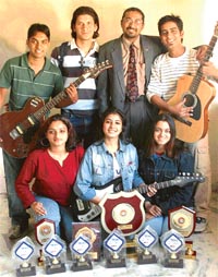 The bubbly band proudly exhibits its trophies