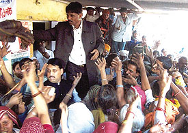 Blankets being distributed to the poor on the birth anniversary of former Prime Minister Indira Gandhi in the Capital on Saturday. 