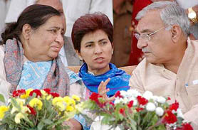 From left: Haryana Health Minister Kartar Devi, Union Minister Kumari Selja, and Haryana Chief Minister Bhupinder Singh Hooda at a state-level function on the Women Empowerment Day in Kurukshetra on Saturday.