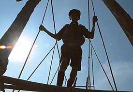 A young boy clears a rope bridge at the state-level Scouts and Guides jamboree held at Shaheed-e-Azam Sukhdev Thapar School, Bharat Nagar Chowk, Ludhiana, on Saturday.