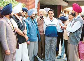Parents of medical students collect outside the SGPC-run Sri Guru Ram Das Institute of Medical Sciences and Research in Amritsar on Saturday. 
