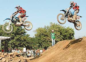 Participants in action in the MRF National Supercross Championship at the Circus Ground, Sector 17, Chandigarh, on Sunday