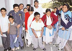 Physically challenged students of Saket High School are all smiles after receiving scholarship from the Shivalik Foundation in Panchkula on Sunday