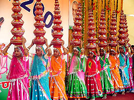 students present a folk-dance item during the event