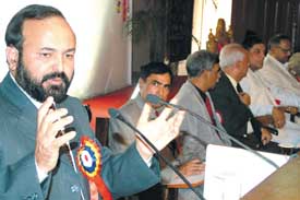 Manoj Kumar Sharma, a UBS lecturer, makes his point at a seminar in DAV College in Jalandhar on Monday. 