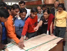 The Deputy Director, Haryana Archives, Dr Rajwanti Mann, explains the significance of rare manuscripts on display at Panchkula
