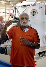 Indian industrialist and aviator Dr Vijaypat Singhania speaks to reporters about his hot air balloon journey Mission Impossible at a press conference at the Mahalaxmi Race Course in Mumbai