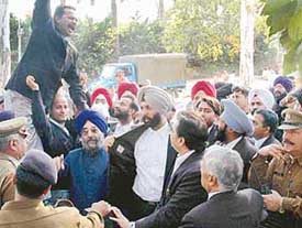 Lawyers protest against the registration of an FIR against human rights lawyer A.S. Chahal near the Police Headquarters, Sector 9, Chandigarh, on Wednesday. 