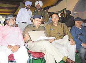 Mr Parag Jain, DIG, Ludhiana, at a grievances redress camp held at Jagraon