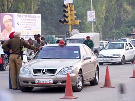 A Mercedes car parked in the middle of a road near the Bathinda bus stand