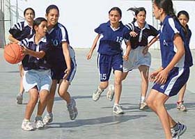 Monika of St Annes School controls the ball during a match against GNPS-36 in the ongoing Fourth Emily Gosain Memorial Basketball Tournament at St Xaviers School in Chandigarh