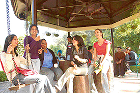 COFFEE BREAK: Students of the College of Arts enjoy the sunshine and a hot cup of coffee.