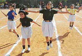 Girls of Mount Carmel School, Sector 47, take part in a sparrow race at their annual sports meet on the school campus in Chandigarh on Friday. 