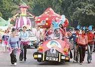 Youngsters add colour to the parade along with floats of varying dimensions and shapes as part of the Chandigarh Carnival being held at Leisure Valley, Sector 10, Chandigarh, on Saturday