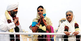 The head of the Nirankari Mission, Baba Hardev Singh Ji Maharaj, his wife and mother at the opening of the annual 58th Nirankari Sant Samagam in the Capital on Saturday