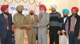 Pargat Singh, Director, Sports, Punjab, being honoured at a function in Ludhiana on Saturday