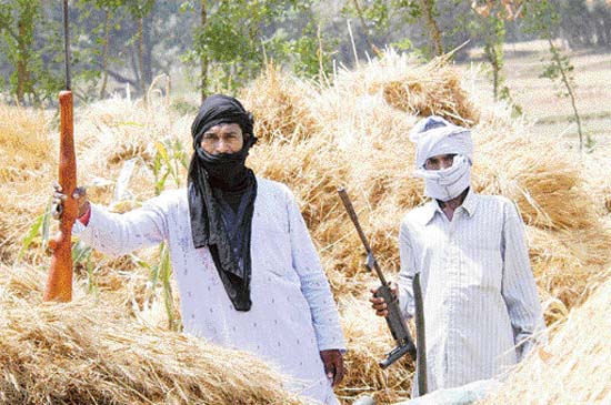 Violence begets violence: A file photo of armed Maoists visiting the Naxal area