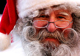 A man dressed as Santa Claus poses for a picture at the Europa Park in Rust, Germany, on Saturday