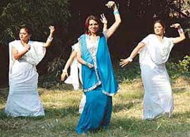 Artistes perform during dummy shooting at Chandigarh Carnival in Sector 10, Chandigarh