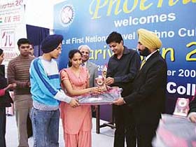Members of Phoenix Club being presented the trophy by Mr Mandeep Singh Gill, Zonal Manager, Airtel, Punjab